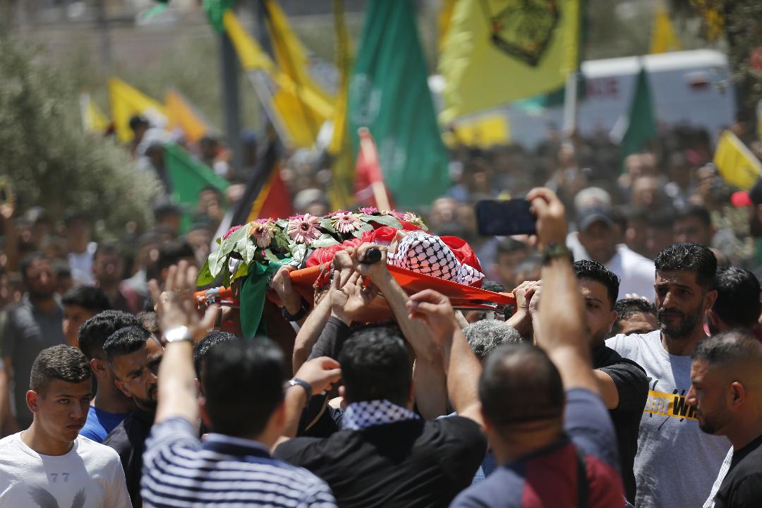 تشييع الفتى أمجد نشأت أبو عليا في قرية المغير شمال رام الله بتاريخ 30-7-2022 (تصوير:وفا)  تشييع الفتى أمجد نشأت أبو عليا في قرية المغير شمال رام الله بتاريخ 30-7-2022 (تصوير:وفا)